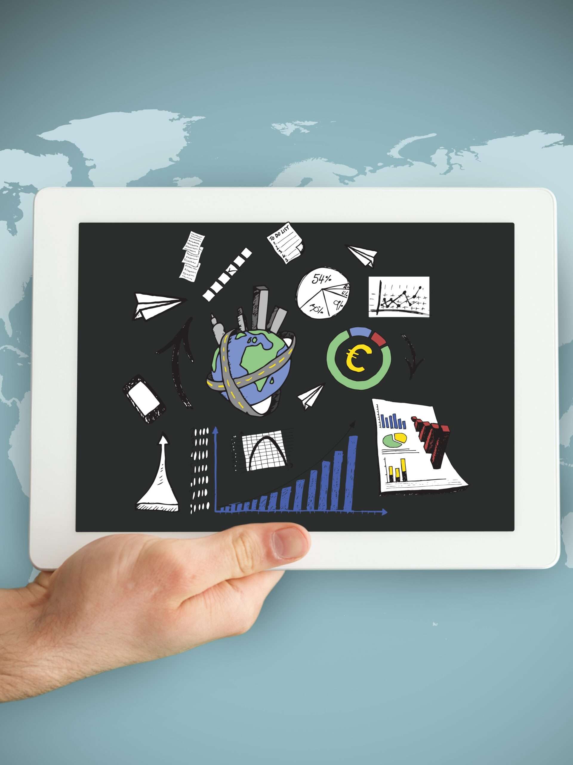 hand holding tablet computer with graphics